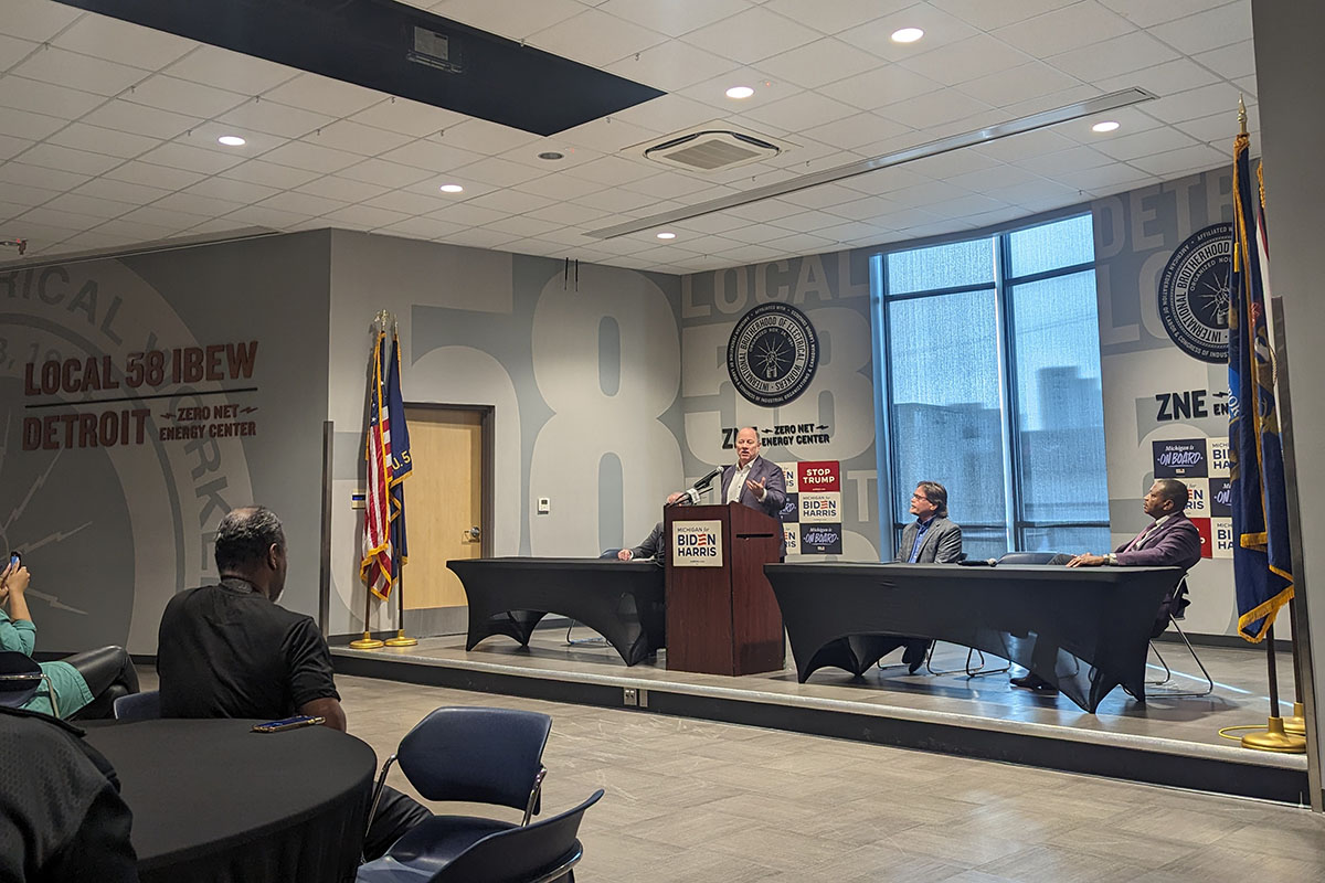 Mike Duggan on stage at an event 