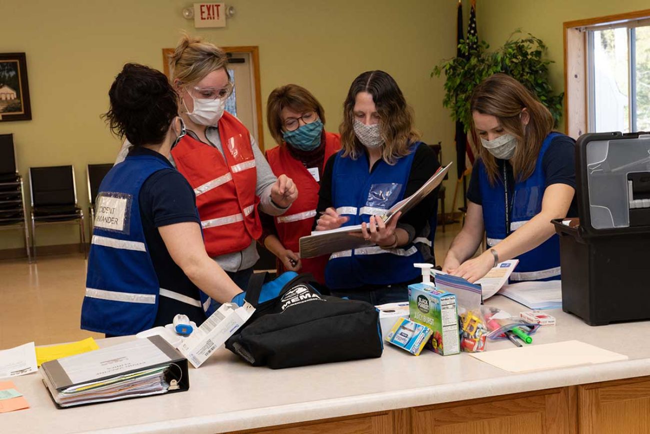 Staff from the LMAS Health Department in the Upper Peninsula readied for a vaccine clinic on Bois Blanc Island in March