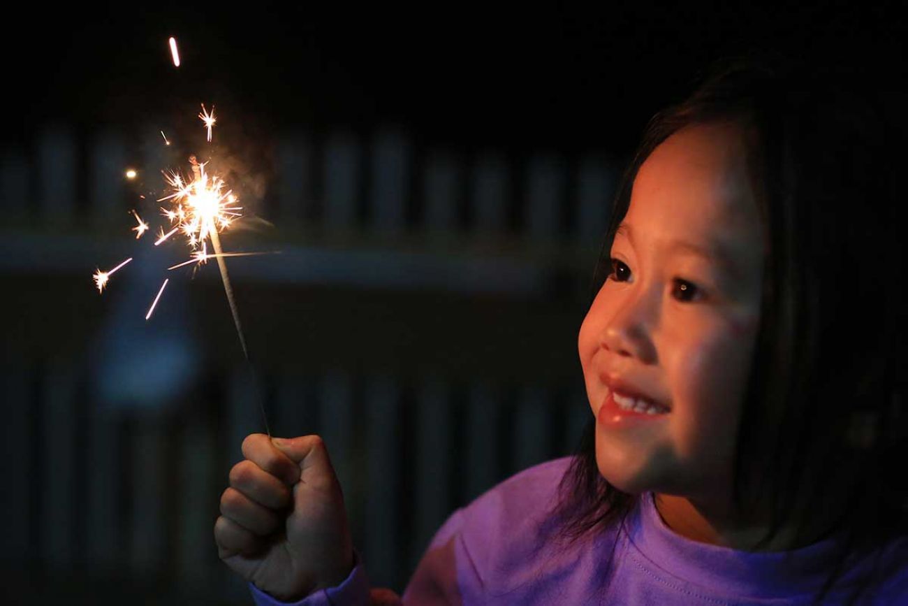 kid with sparkler