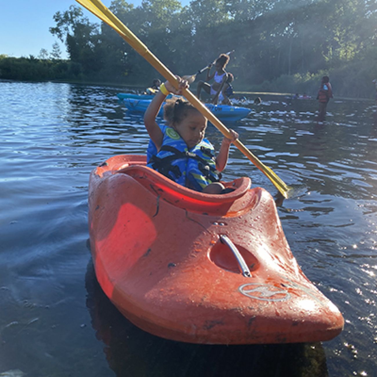 little girl in canoe