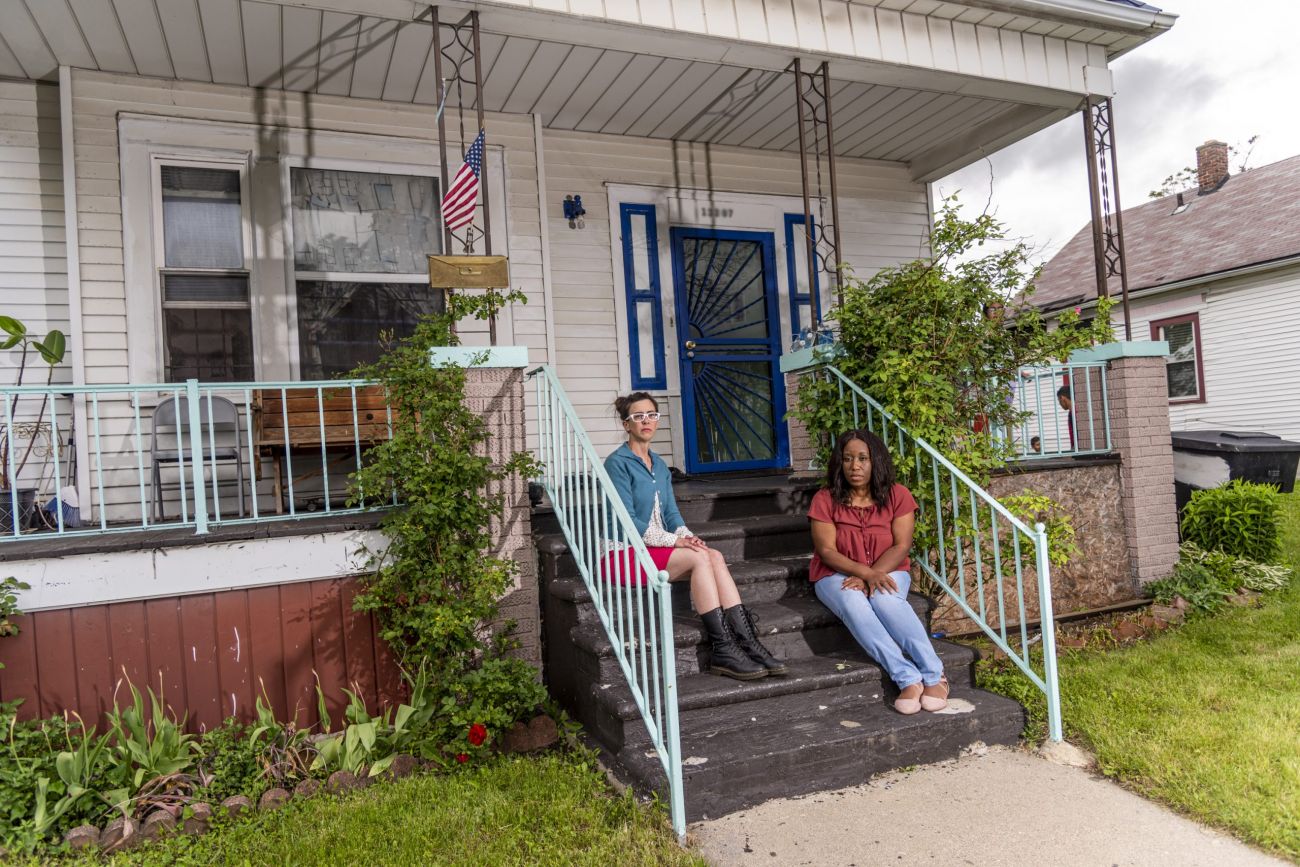 people sitting on porch