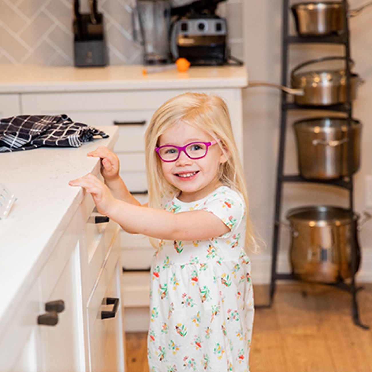 child in kitchen