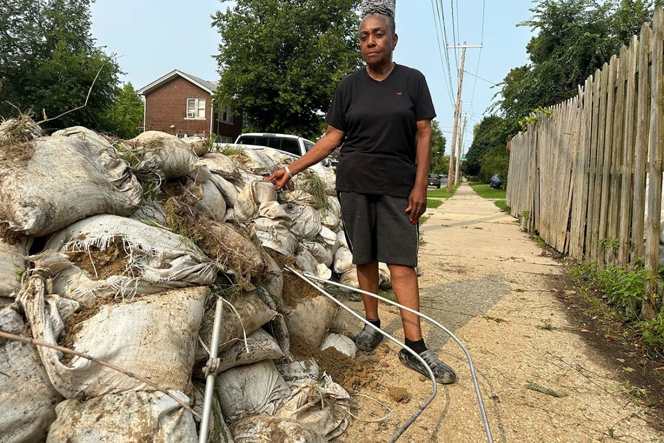 someone standing to sandbags in Detroit