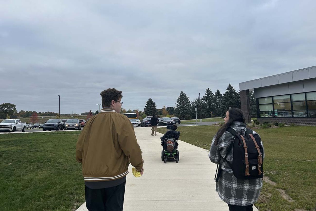 people walking on the sidewalk