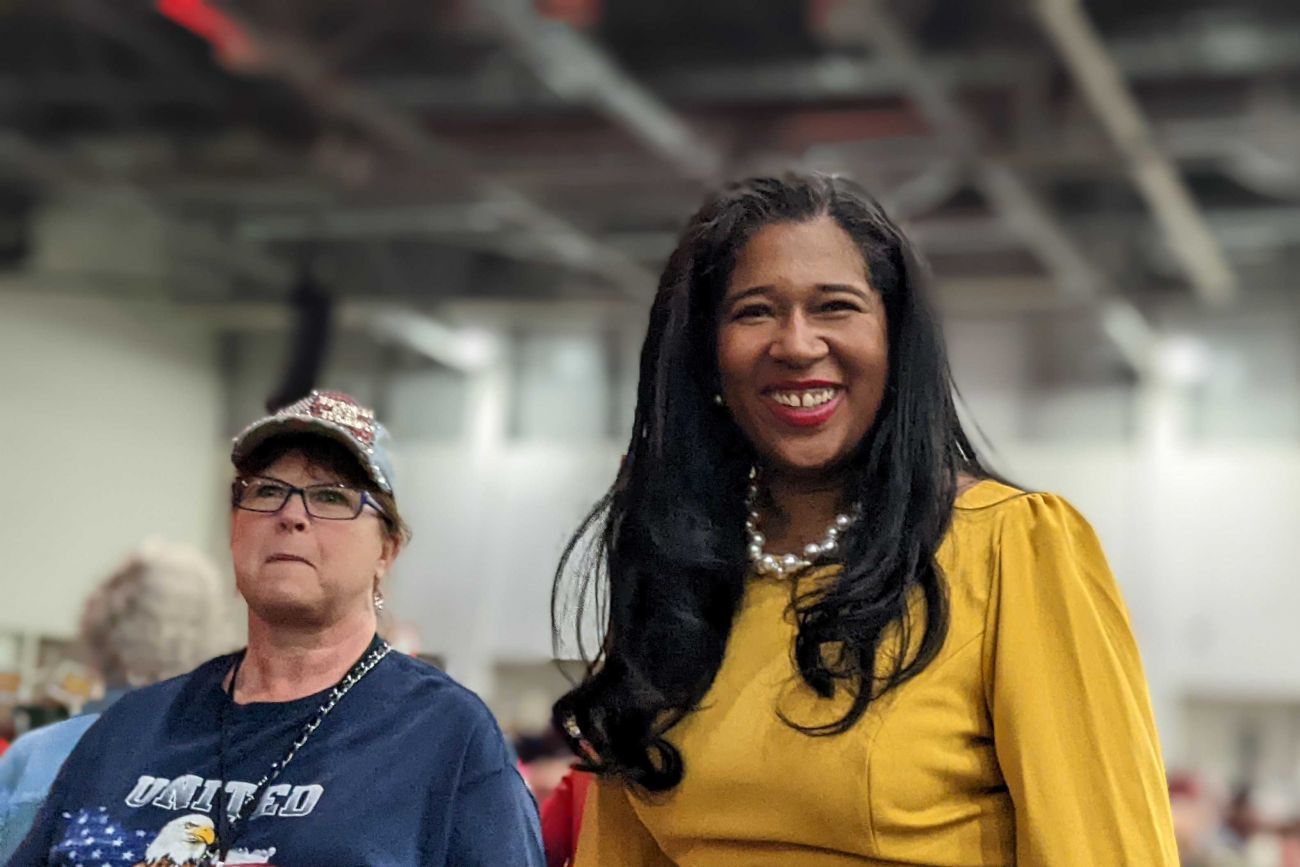 Michigan GOP Chair Kristina Karamo posing for a picture