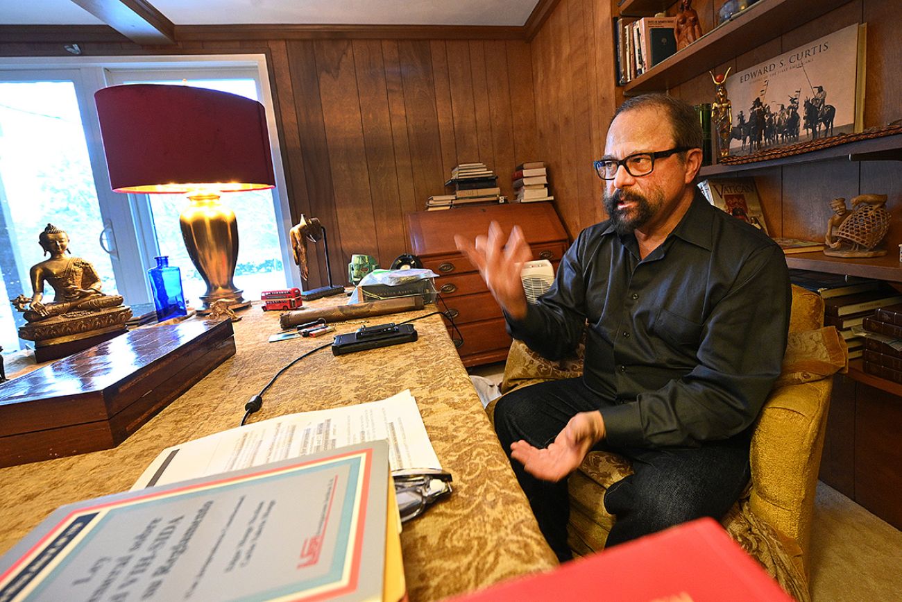 Professor Marco Díaz-Muñoz sitting in a desk