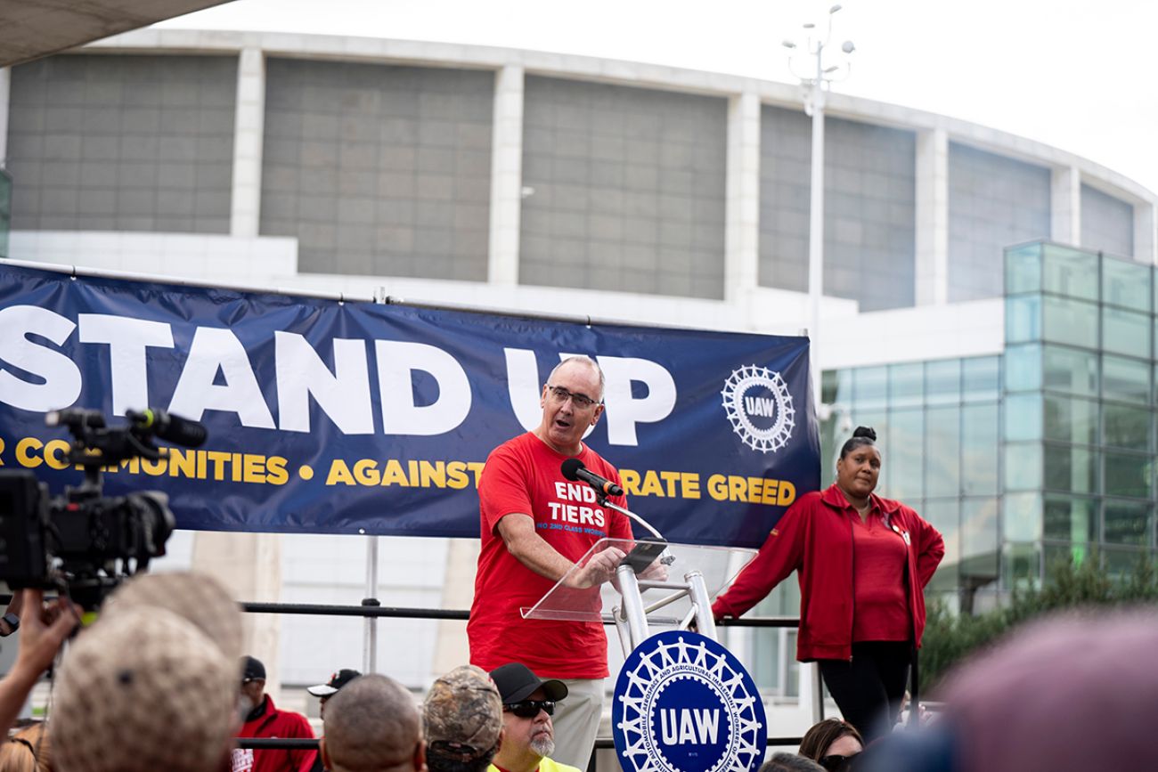 UAW President Shawn Fain on stage