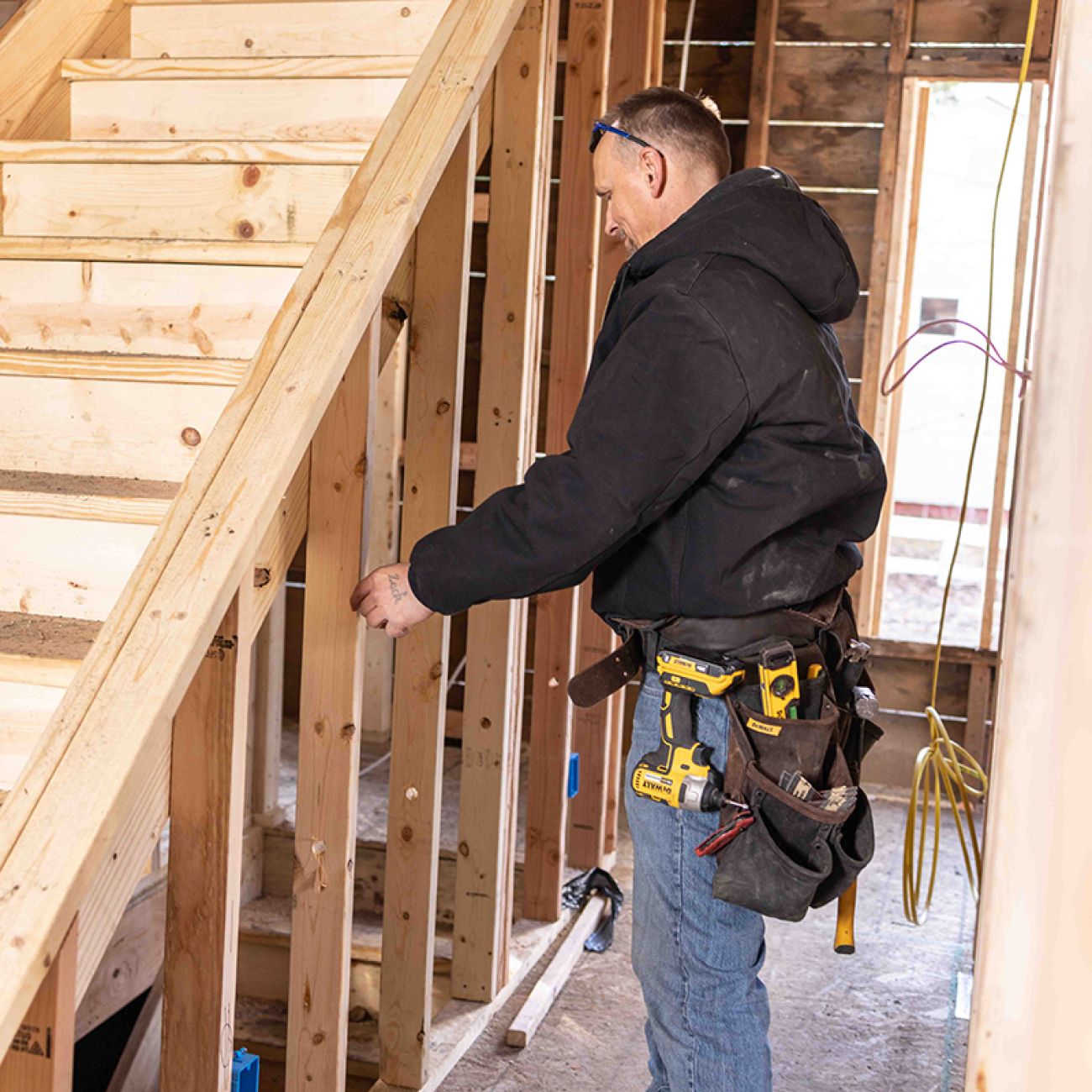 Brian Warsow constructing a house