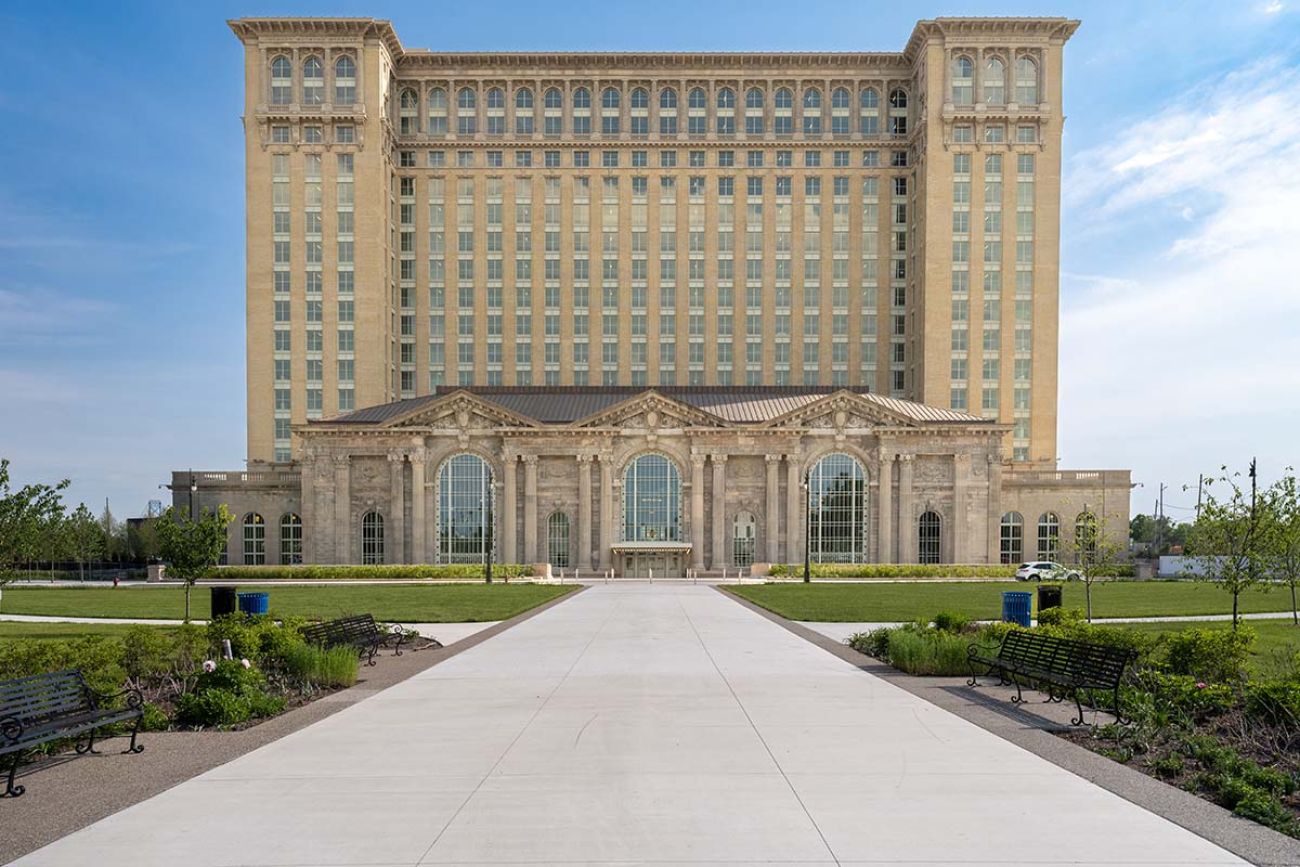 a large limestone building. it has several windows and tall