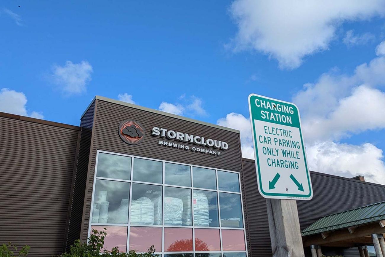 EV charging sign in front of Stormcloud Brewery