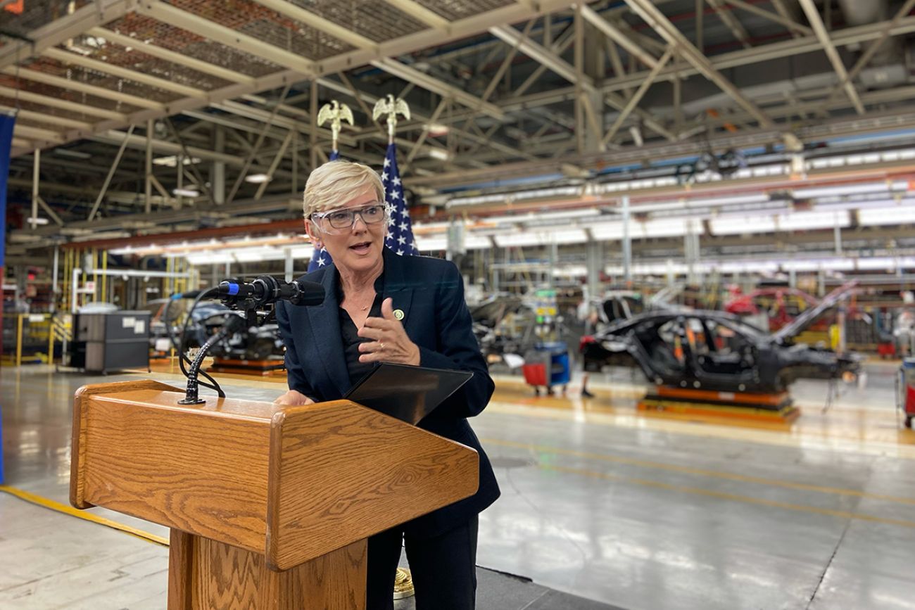 U.S. Secretary of Energy Jennifer Granholm speaking into a microphone