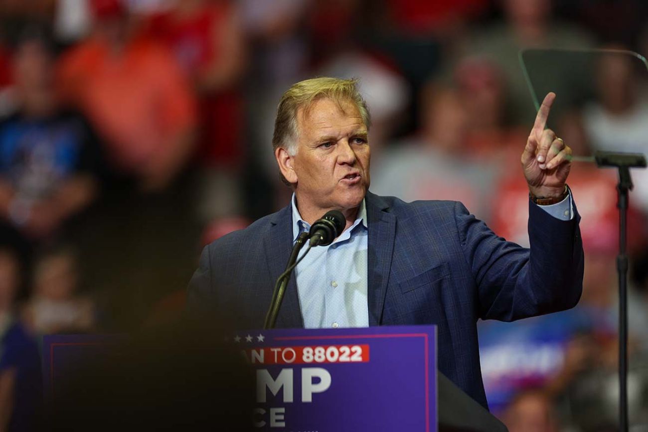 Mike Rogers on the stage at a Trump rally