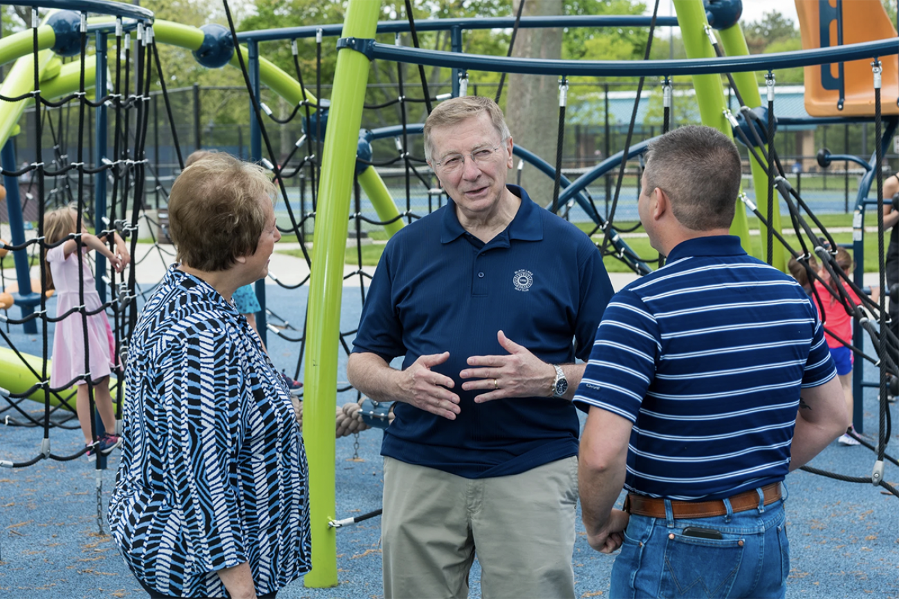 Carl Marlinga speaking to people at a park