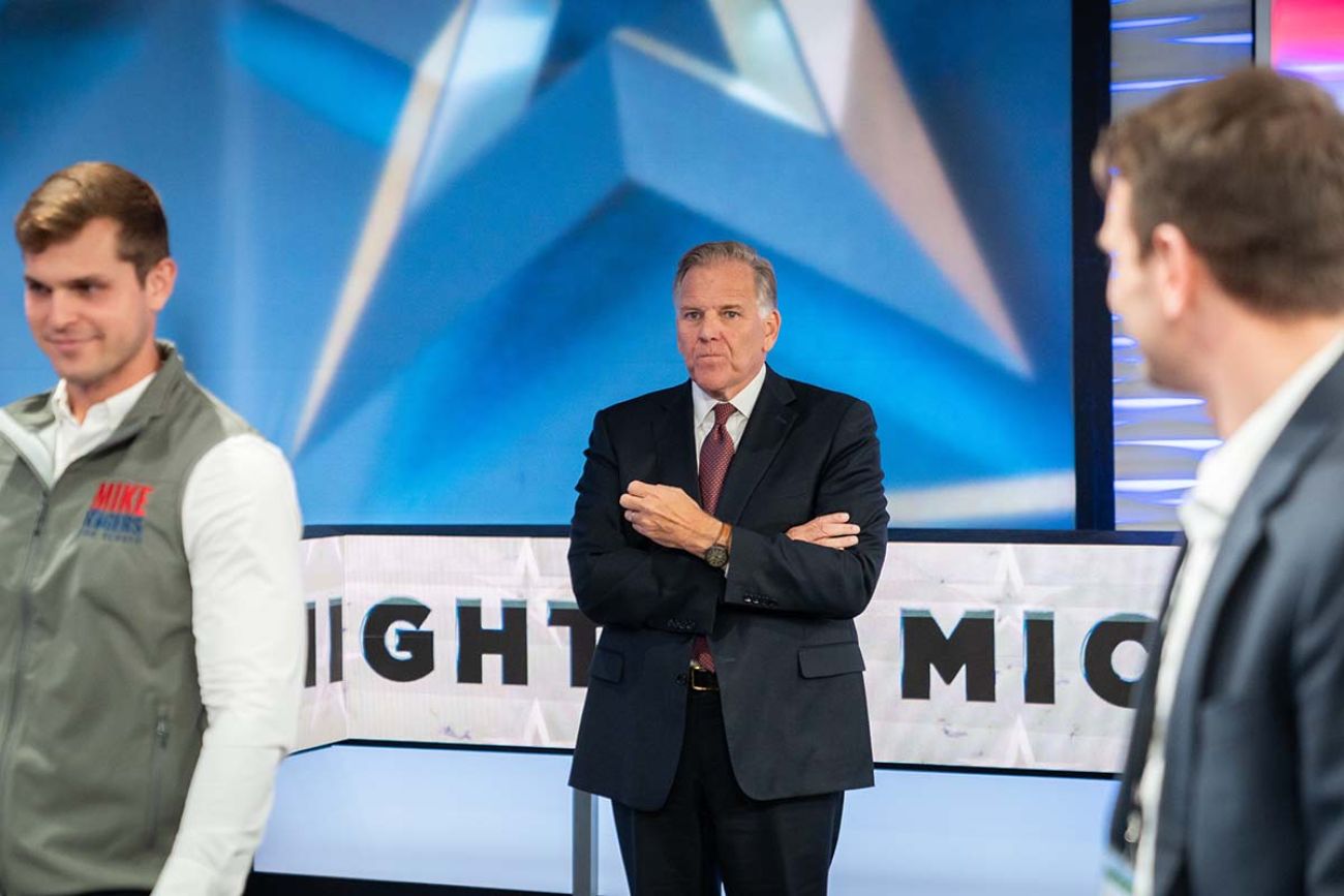 Mike Rogers standing at the debate stage