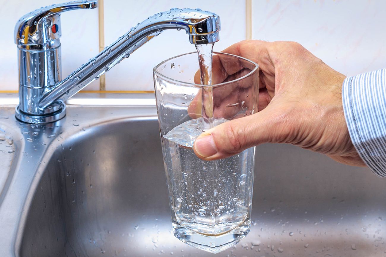 glass with tap water and water glass