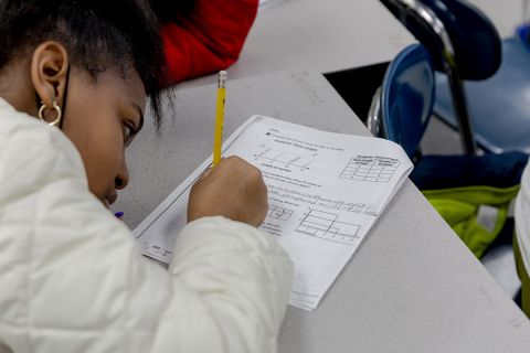 girl doing schoolwork