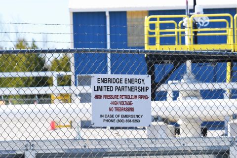 enbridge sign on fence