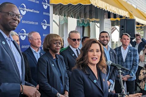 Gov. Gretchen Whitmer speaking into microphone