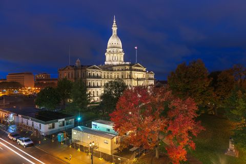 Lansing, Michigan at the Michigan State Capitol during the evening.