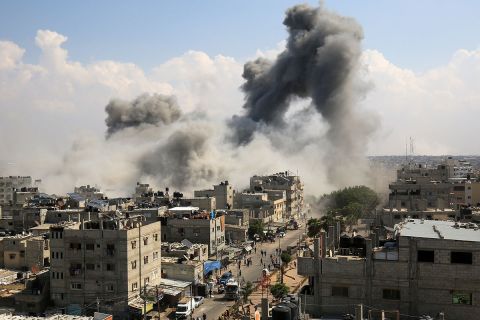 Smoke rises after Israeli air strikes of the city of Rafah in the southern Gaza Strip, October 10, 2023.