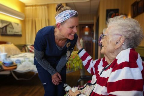 medical assistant talking to patient 