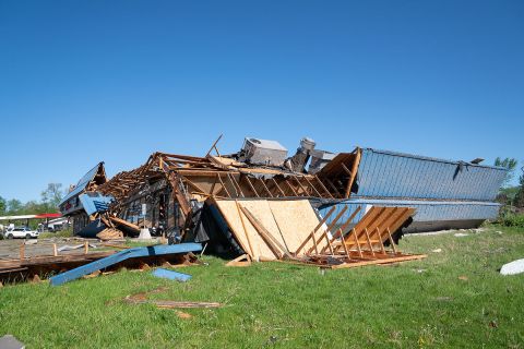 heavily damaged building after a tornado in Michigan