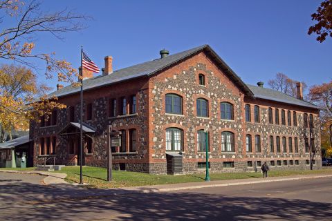 A brown, two-story building