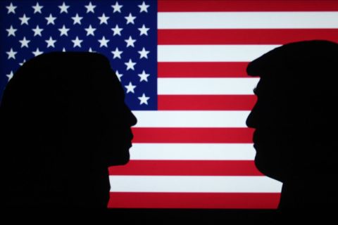 Silhouettes of Kamala Harris and Donald Trump.