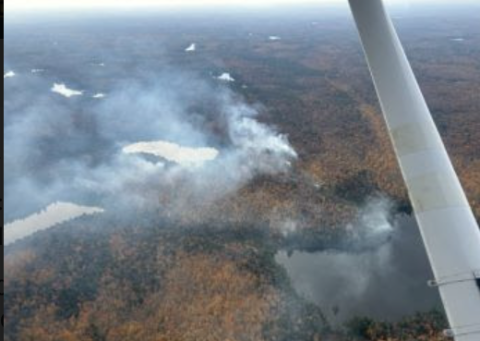 An aerial view of smoke from a wildfire in the Upper Peninsula