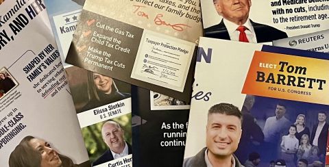 A pile of mail-in advertisements of political ads