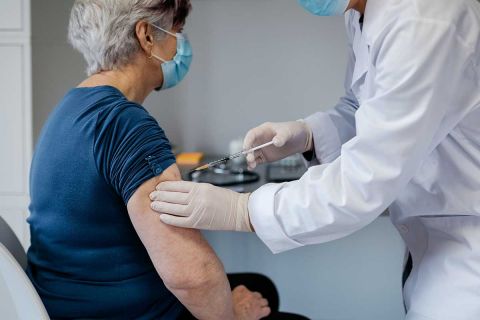 woman being vaccinated