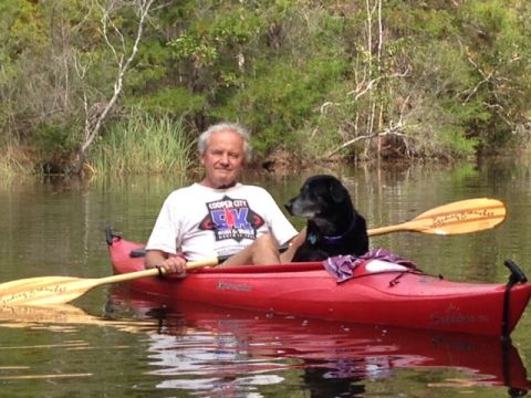 Tom Henderson and his dog, Maddie. 