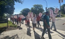 people marching on Eastern Michigan University's campus