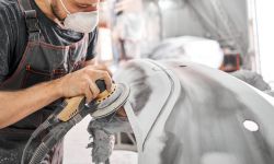 man working on a car