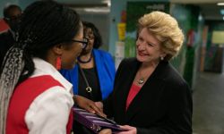 Debbie Stabenow talking to someone