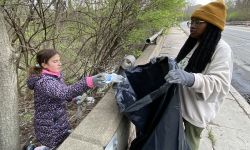 people cleaning up the river