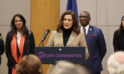 Michigan Gov. Gretchen Whitmer speaking into microphone