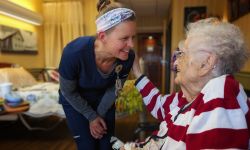 medical assistant talking to patient 