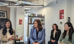 Gov. Gretchen Whitmer listening to people at a roundtable