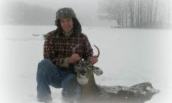 man holding deer