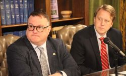 House Minority Leader Matt Hall, R-Richland Township, and Senate Minority Leader Aric Nesbitt, R-Porter Township, sit down at a table