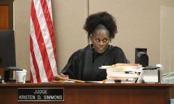 54-A District Court Judge Kristen Simmons in a courtroom behind the bench