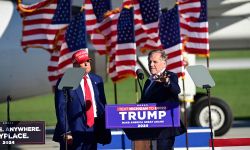 Mike Rogers on the stage with Donald Trump