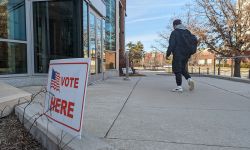 Vote here sign on Michigan State University's campus 