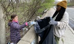 Volunteers picking up trash from the Rogue River