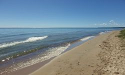 a beach on Lake Michigan on a sunny day