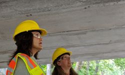 Michigan Gov. Gretchen Whitmer wearing a yellow hard hat