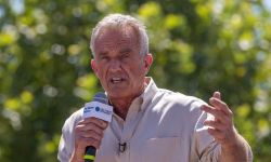 Robert F. Kennedy Jr. speaking into a microphone