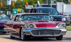 Cruisers show at Woodward dream cruise. In front is a red classic car