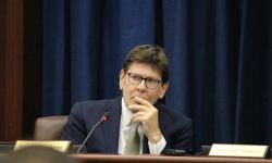 Board of State Canvassers Vice Chair Richard Houskamp sitting at a table